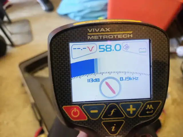 Vivax-Metrotech vLoc pipe and cable locator screen showing signal strength and depth
